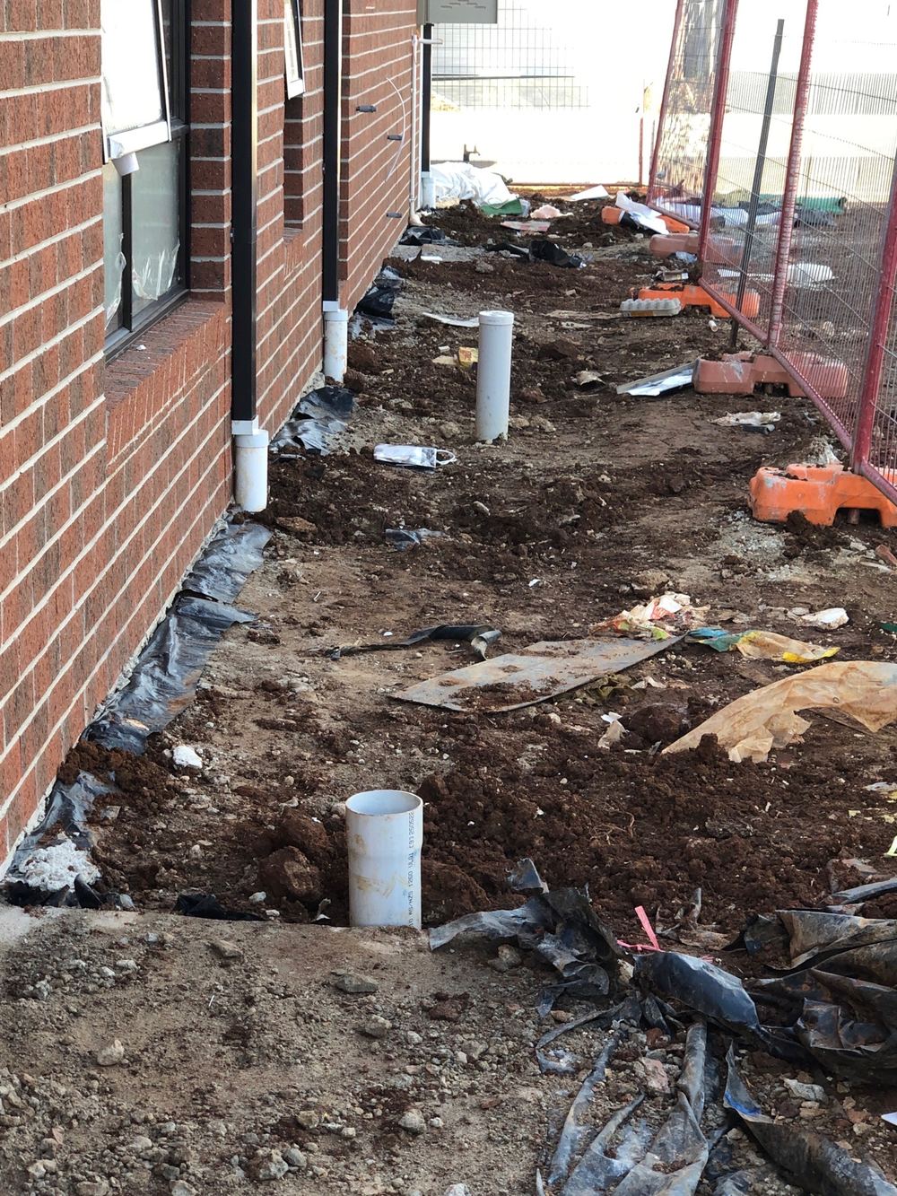 Ground beside the slab not yet graded to fall away from the house, Strathtulloh