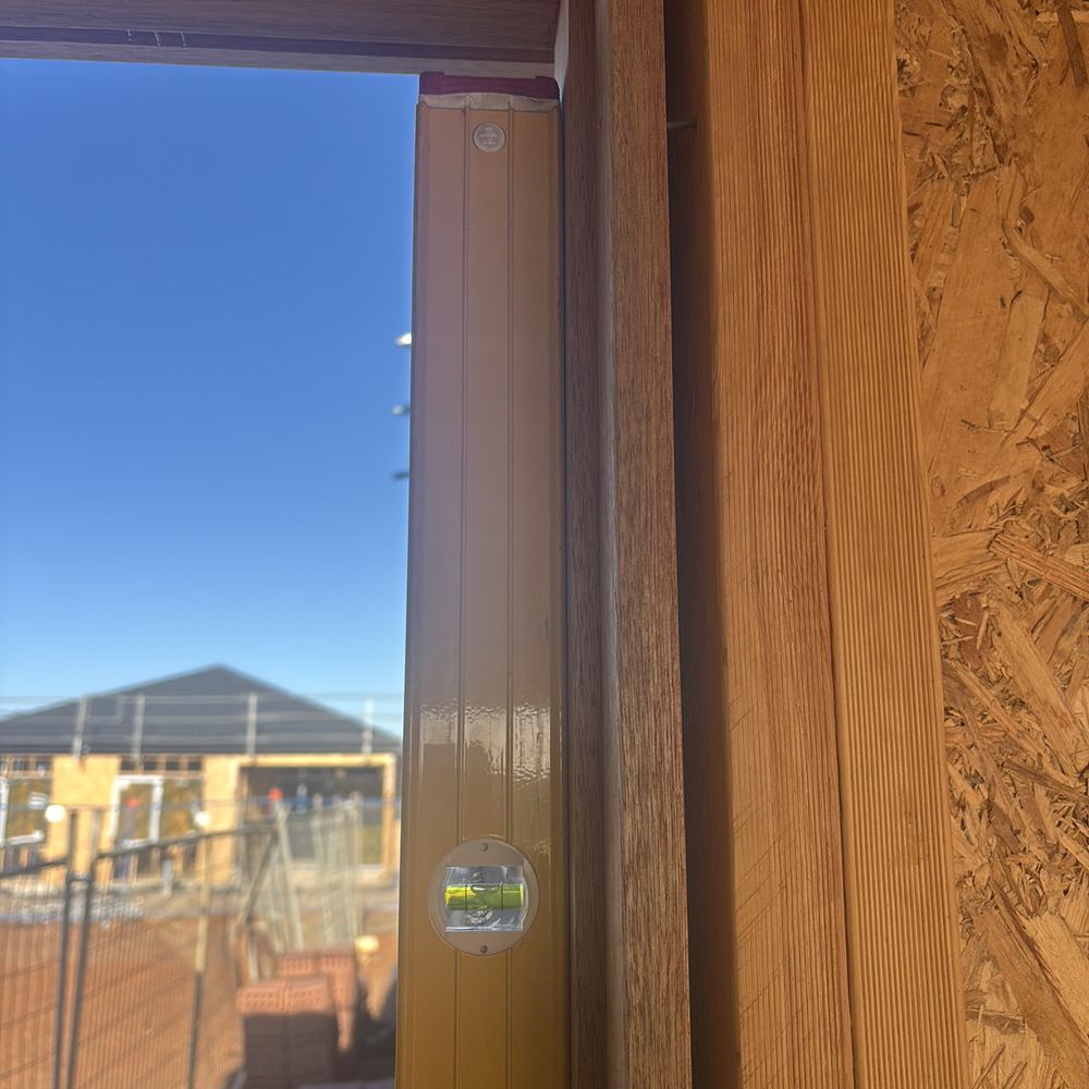 External door frame fitted out of plumb with no room for plaster stopping, Strathtulloh