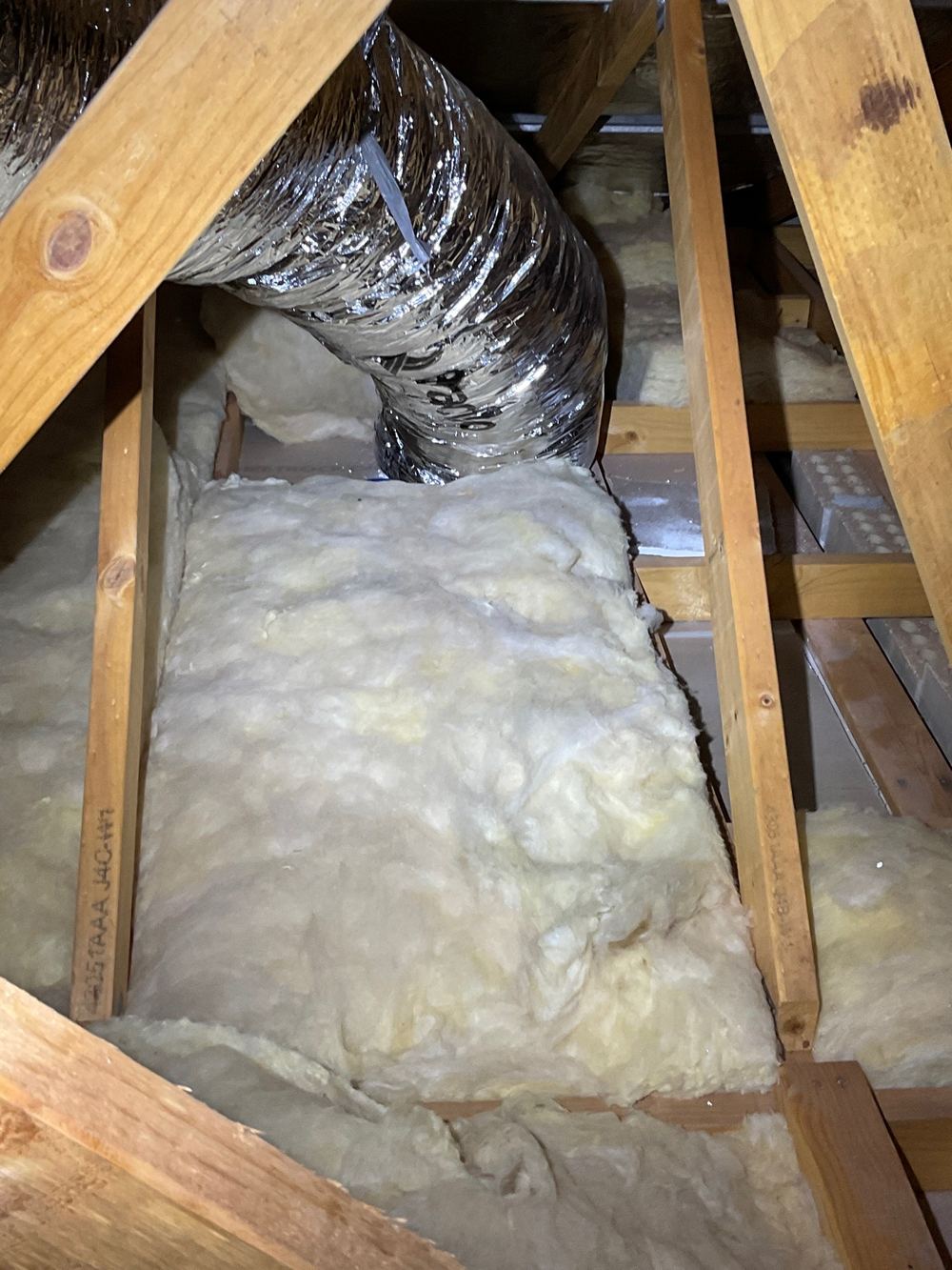 Ceiling batts pushed out of place, leaving bare patches above rooms, Strathtulloh